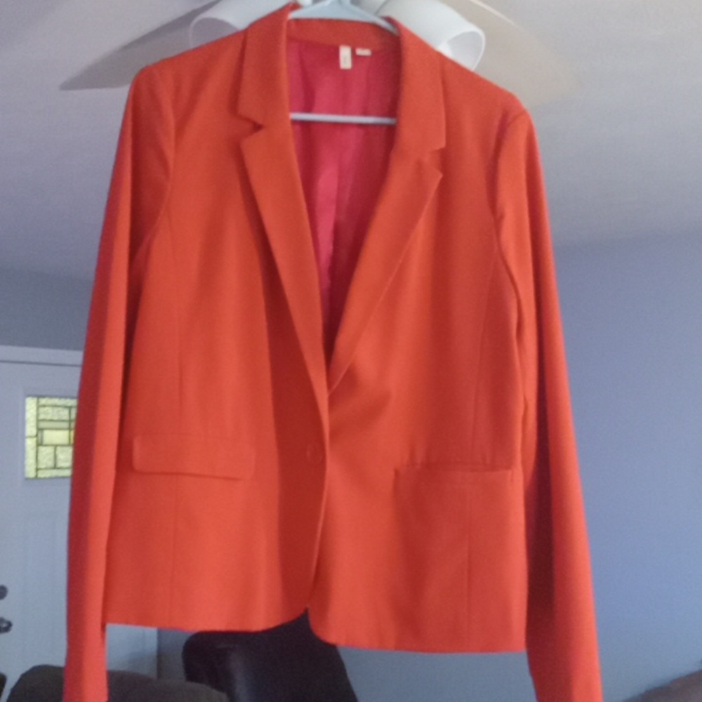 Reddish orange blazer